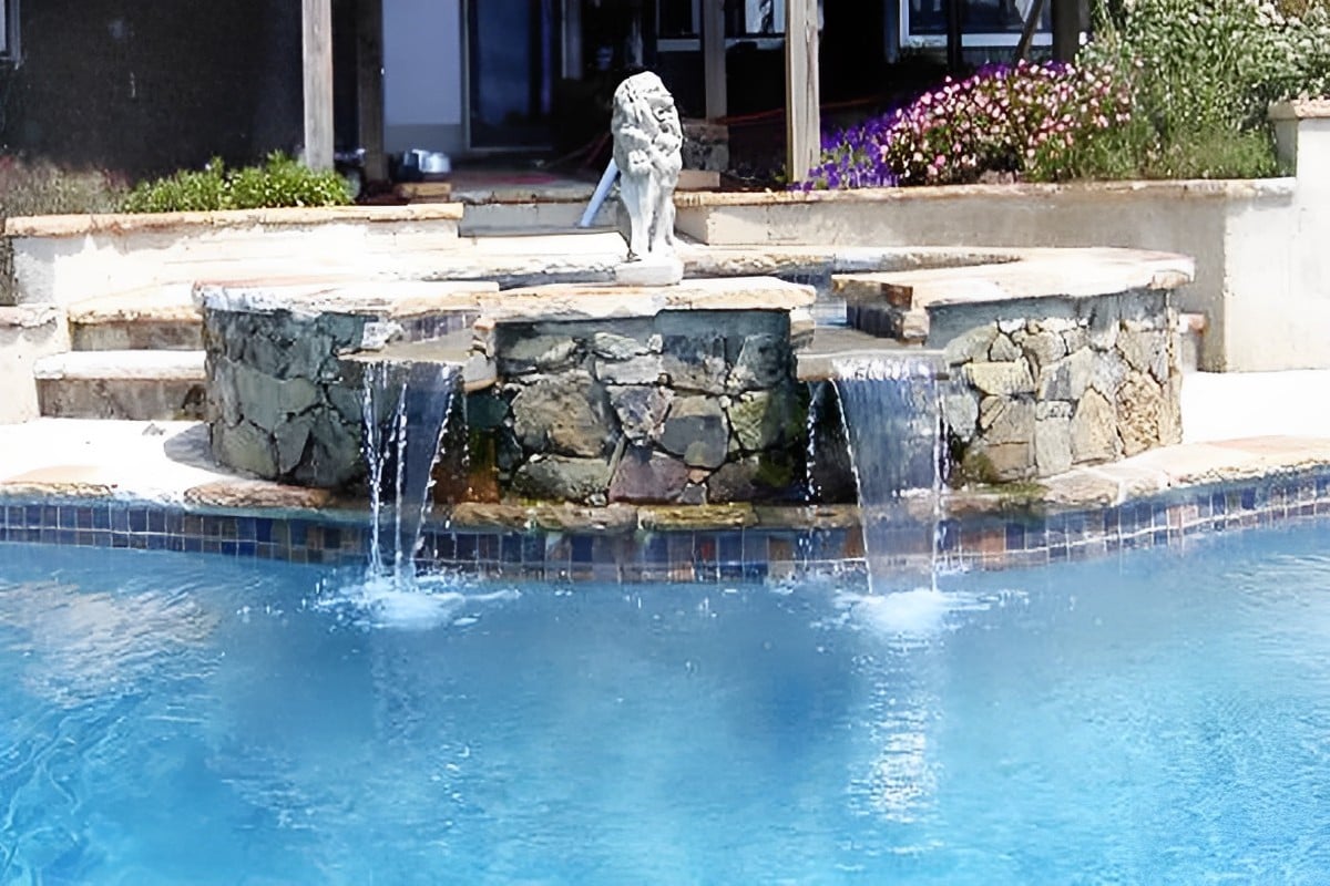 raised stone spa over custom pool near Leesburg, Va